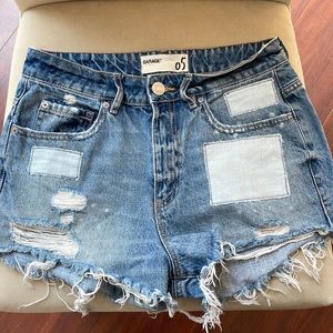 Distressed jean shorts